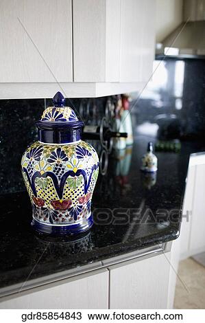 Stock Image - Jar on the kitchen counter. Fotosearch