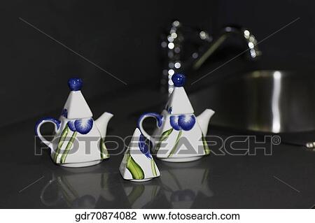 Kettles on a kitchen counter View Large Photo Image Stock Image - Kettles on a kitchen counter. Fotosearch