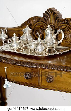 Kettles on a sideboard in a living room View Large Photo Image Stock Photo - Kettles on a sideboard in a living room. Fotosearch