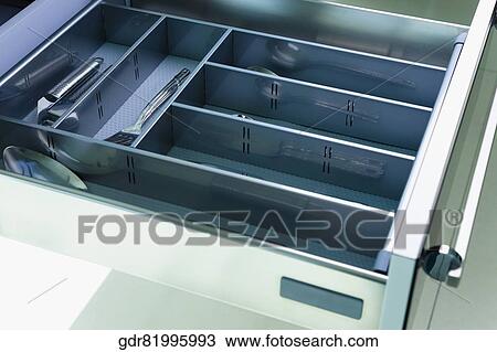 Kitchen utensils in a drawer View Large Photo Image Stock Image - Kitchen utensils in a drawer. Fotosearch