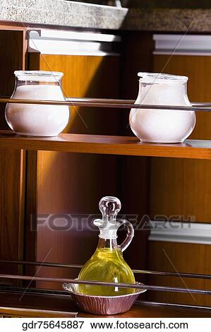 Kitchen utensils on a rack View Large Photo Image Stock Photo - Kitchen utensils on a rack. Fotosearch