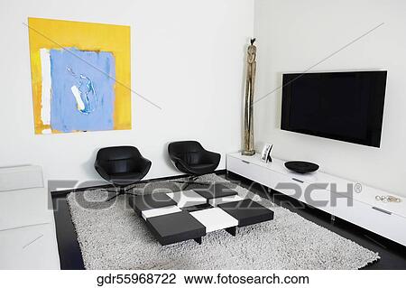 LCD television mounted on a wall View Large Photo Image Stock Image - LCD television mounted on a wall. Fotosearch
