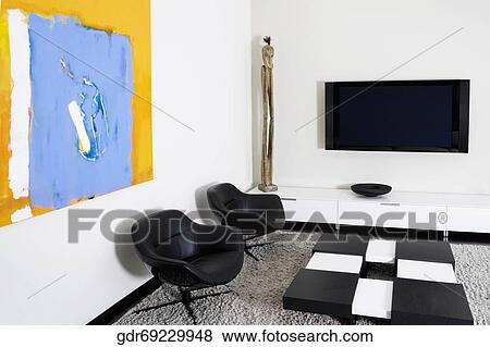 Stock Photo - LCD television mounted on a wall. Fotosearch