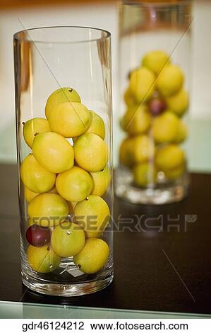 Lemons in glasses View Large Photo Image Stock Image - Lemons in glasses. Fotosearch