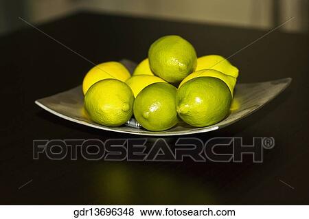 Lemons on a tray View Large Photo Image Stock Photo - Lemons on a tray. Fotosearch
