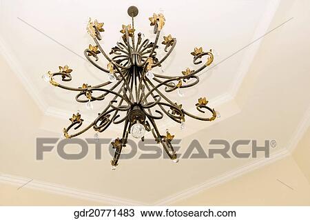 Low angle view of a chandelier View Large Photo Image Stock Image - Low angle view of a chandelier. Fotosearch
