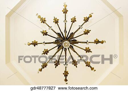 Low angle view of a chandelier View Large Photo Image Stock Photo - Low angle view of a chandelier. Fotosearch