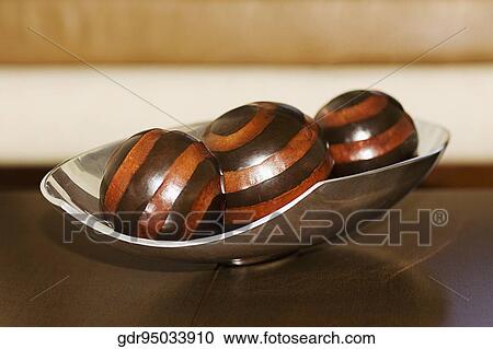 Painted stones in a tray View Large Photo Image Stock Image - Painted stones in a tray. Fotosearch
