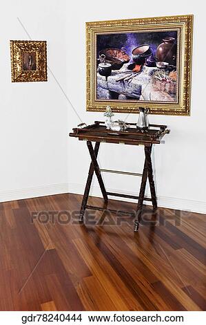 Picture - Paintings in a living room. Fotosearch