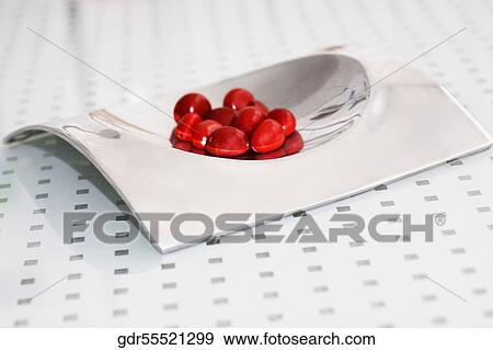 Pebbles in a tray on a table View Large Photo Image Stock Photo - Pebbles in a tray on a table. Fotosearch