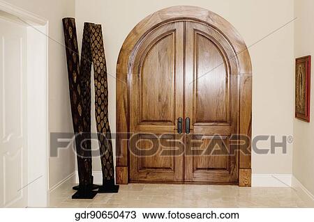 Stock Image - Pillars near a door. Fotosearch