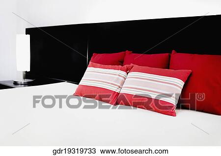 Stock Image - Pillows on the bed. Fotosearch