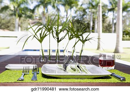 Place setting on a dining table View Large Photo Image Stock Image - Place setting on a dining table. Fotosearch