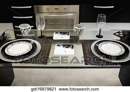 Stock Image - Place setting on a dining table. Fotosearch