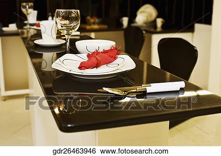 Stock Photograph - Place setting on a dining table. Fotosearch