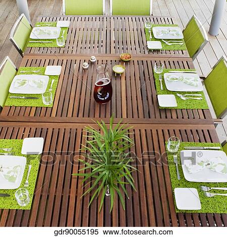 Place setting on a dining table View Large Photo Image Stock Photography - Place setting on a dining table. Fotosearch