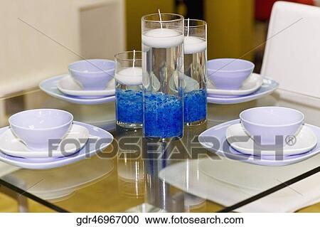 Porcelain setting on a dining table View Large Photo Image Stock Image - Porcelain setting on a dining table. Fotosearch