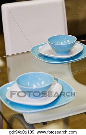Porcelain setting on a dining table View Large Photo Image Stock Photo - Porcelain setting on a dining table. Fotosearch
