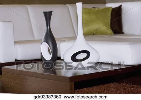 Porcelain vases on a table View Large Photo Image Stock Image - Porcelain vases on a table. Fotosearch