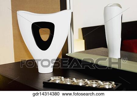 Reflection of a vase in a mirror View Large Photo Image Stock Image - Reflection of a vase in a mirror. Fotosearch