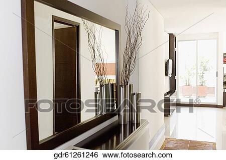 Reflection of showpieces in a mirror View Large Photo Image Stock Photograph - Reflection of showpieces in a mirror. Fotosearch