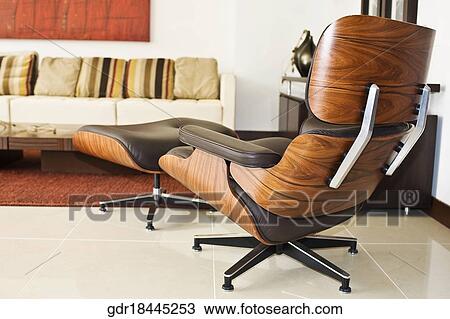 Revolving chair in a living room View Large Photo Image Stock Image - Revolving chair in a living room. Fotosearch