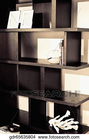 Shelf in a living room View Large Photo Image Picture - Shelf in a living room. Fotosearch