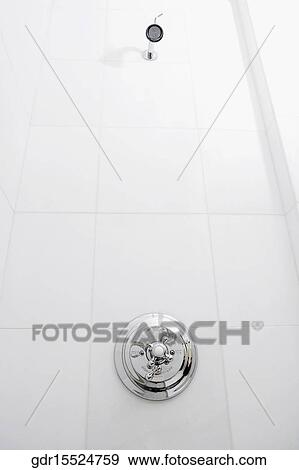 Shower knob and shower in the bathroom View Large Photo Image Stock Photo - Shower knob and shower in the bathroom. Fotosearch