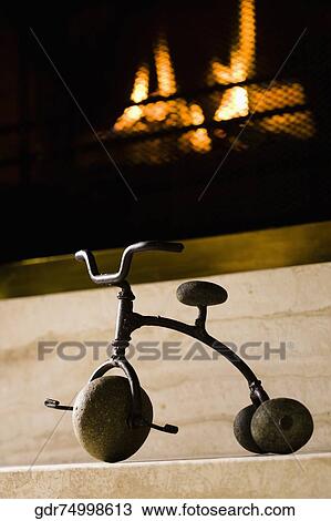 Stock Image - Showpiece near a fireplace. Fotosearch