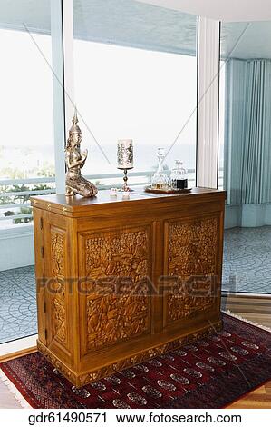 Showpieces on a chest View Large Photo Image Stock Image - Showpieces on a chest. Fotosearch