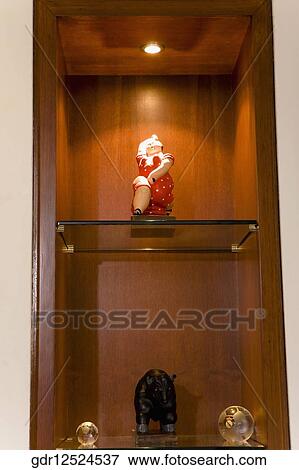 Showpieces on a showcase View Large Photo Image Stock Photo - Showpieces on a showcase. Fotosearch
