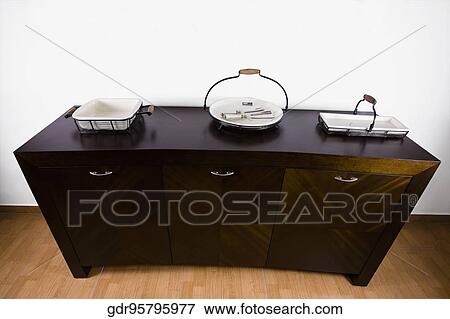 Showpieces on a sideboard View Large Photo Image Stock Photo - Showpieces on a sideboard. Fotosearch