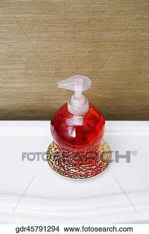 Soap dispenser in the bathroom View Large Photo Image Picture - Soap dispenser in the bathroom. Fotosearch