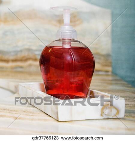 Soap dispenser in the bathroom View Large Photo Image Stock Image - Soap dispenser in the bathroom. Fotosearch