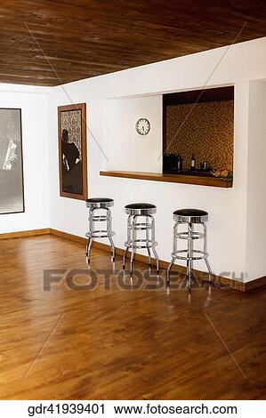 Stools near a counter View Large Photo Image Stock Image - Stools near a counter. Fotosearch