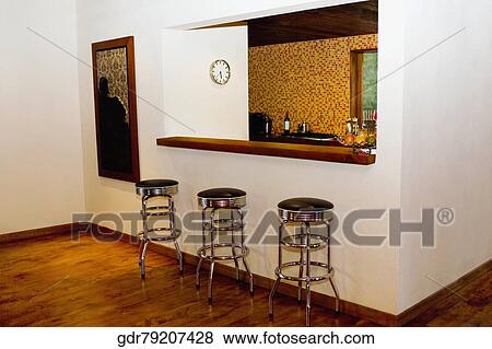 Stock Photo - Stools near a kitchen. Fotosearch