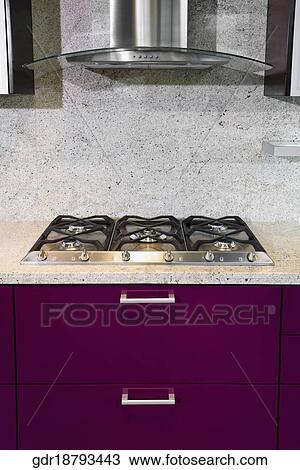 Stock Image - Stove on a kitchen counter. Fotosearch