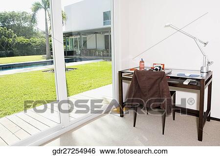 Study table in a study room View Large Photo Image Stock Photograph - Study table in a study room. Fotosearch