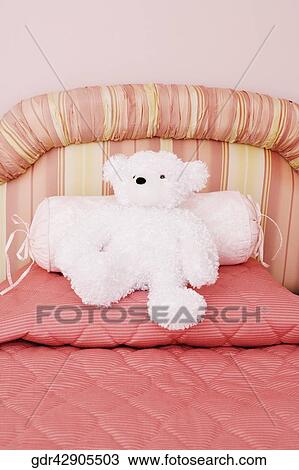 Stuffed toy on the bed View Large Photo Image Stock Image - Stuffed toy on the bed. Fotosearch