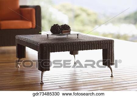 Table and an armchair on the patio View Large Photo Image Stock Image - Table and an armchair on the patio. Fotosearch