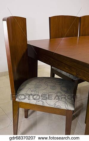 Stock Photo - Table with chairs in a dining room. Fotosearch