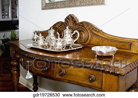 Tea set on a sideboard View Large Photo Image Stock Image - Tea set on a sideboard. Fotosearch