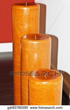 Three candles in row View Large Photo Image Stock Image - Three candles in row. Fotosearch