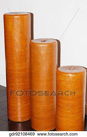 Three candles in row View Large Photo Image Stock Photo - Three candles in row. Fotosearch