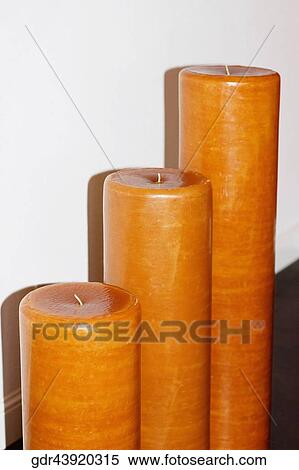 Three candles in row View Large Photo Image Stock Photography - Three candles in row. Fotosearch