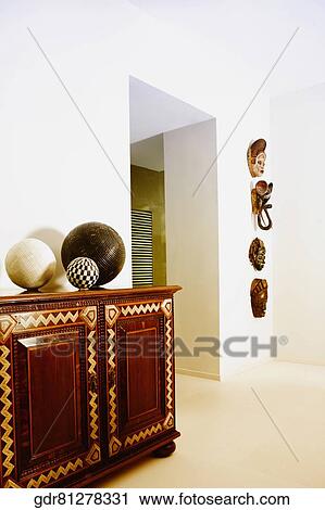 Three decorative balls on a chest View Large Photo Image Stock Image - Three decorative balls on a chest. Fotosearch