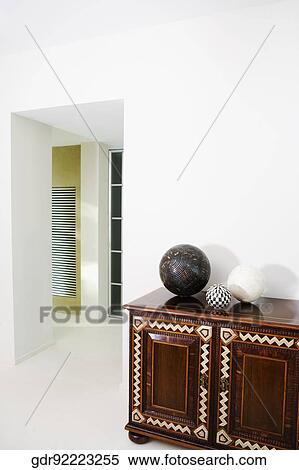 Three decorative balls on a chest View Large Photo Image Stock Photography - Three decorative balls on a chest. Fotosearch