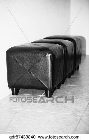 Three ottomans in a living room View Large Photo Image Stock Image - Three ottomans in a living room. Fotosearch