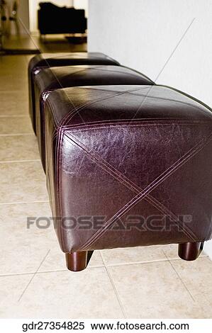 Three ottomans in a living room View Large Photo Image Stock Photography - Three ottomans in a living room. Fotosearch