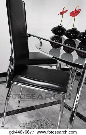 Stock Photo - Three vases on a dining table. Fotosearch